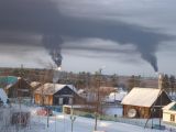 Уже больше недели сильно дымят факела расположенные вблизи села Селиярово.